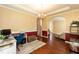 Home office featuring hardwood floors, desk, and ample space for work at 212 Mickleson Ridge Dr, Raleigh, NC 27603