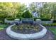 Stone Eagle Ridge Golf Community entrance sign with a beautiful flower bed for a welcoming entrance at 212 Mickleson Ridge Dr, Raleigh, NC 27603