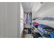Organized walk-in closet featuring clothing and accessories, all neatly stored and easily accessible at 2520 Ashley Ct, Raleigh, NC 27607