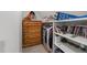 Organized closet with shelving, hanging clothes, decorative items, and personal belongings neatly arranged at 2520 Ashley Ct, Raleigh, NC 27607
