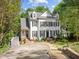 Charming two-story home with black shutters and landscaped front yard in a lush green neighborhood at 2520 Ashley Ct, Raleigh, NC 27607