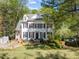 Traditional two-story home with black shutters, dormers, and manicured lawn at 2520 Ashley Ct, Raleigh, NC 27607