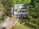 Desirable two-story house with black shutters, dormers, landscaped yard, and concrete driveway at 2520 Ashley Ct, Raleigh, NC 27607