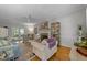 Living room showcasing a fireplace, refined traditional décor, hardwood floors, and white crown molding at 2520 Ashley Ct, Raleigh, NC 27607