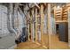 Unfinished basement with exposed ductwork and pipes, perfect for customization at 255 Seven Island Rd, Pittsboro, NC 27312