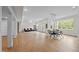 Spacious living area combines dining and lounging with ample natural light and access to the backyard at 255 Seven Island Rd, Pittsboro, NC 27312