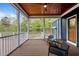 Relax on this screened porch with a wood ceiling and enjoy the wooded backyard views at 255 Seven Island Rd, Pittsboro, NC 27312