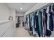 Walk-in closet with ample shelving and clothing racks at 255 Seven Island Rd, Pittsboro, NC 27312