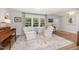 Cozy living area with chairs, a patterned rug, and a view of the outdoors at 2960 Epps Clark Rd, Siler City, NC 27344