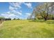 Vast property with rolling hills, lush greenery, and various structures at 2960 Epps Clark Rd, Siler City, NC 27344