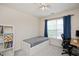 Cozy bedroom with neutral carpet, natural light from a large window, and built in storage at 308 Apricot Cir, Morrisville, NC 27560