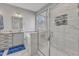 Bathroom featuring a tiled walk-in shower, soaking tub and vanity with granite countertop at 350 Stephens Way, Youngsville, NC 27596