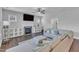 Inviting living room featuring a cozy fireplace, comfortable seating, and plenty of natural light at 350 Stephens Way, Youngsville, NC 27596