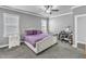 Bright main bedroom with a ceiling fan and plenty of natural light at 350 Stephens Way, Youngsville, NC 27596