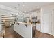 Bright kitchen featuring stainless steel appliances, granite countertops, and an open floor plan to living area at 3735 Landshire View Ln, Raleigh, NC 27616
