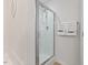 Walk-in shower with glass doors and tiled floor at 3735 Landshire View Ln, Raleigh, NC 27616
