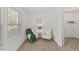 Sitting area with neutral walls, carpet, seating and natural light at 3735 Landshire View Ln, Raleigh, NC 27616