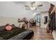A unique bedroom under a sloped ceiling with wood floors, and decor at 375 Alcock Ln, Youngsville, NC 27596