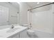 Clean bathroom with a shower-tub combo and ample lighting at 378 E Raleigh Ave, Liberty, NC 27298