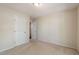 Standard bedroom featuring neutral carpeting and a double door closet at 378 E Raleigh Ave, Liberty, NC 27298