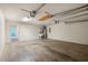 Functional two-car garage with utility sink and access to living spaces at 378 E Raleigh Ave, Liberty, NC 27298