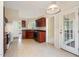 Functional kitchen with ample cabinet space, essential appliances, and an adjacent dining area at 378 E Raleigh Ave, Liberty, NC 27298