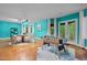 Spacious basement featuring a foosball table, game table, and an inviting seating area with abundant natural light at 417 Swans Mill Xing, Raleigh, NC 27614