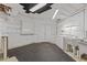 Unfinished basement with ample storage space, including shelving and cabinets, ready for customization at 417 Swans Mill Xing, Raleigh, NC 27614