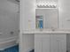 Well-lit bathroom showcasing double sinks, a spacious vanity, and a shower-tub combination at 417 Swans Mill Xing, Raleigh, NC 27614