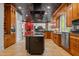 Spacious kitchen boasts custom wood cabinetry, a large island, and high-end stainless steel appliances at 417 Swans Mill Xing, Raleigh, NC 27614