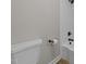 Bathroom with a toilet, shower head and other fixtures at 423 N Main St, Wendell, NC 27591