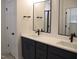 Bathroom with double sinks, mirrors and new fixtures at 4330 Medicus Ln, Franklinton, NC 27525