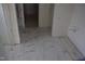 Unfinished bathroom with marble floor tiles at 4330 Medicus Ln, Franklinton, NC 27525