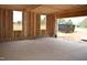 Unfinished garage displaying block foundation with framed walls and window openings at 4330 Medicus Ln, Franklinton, NC 27525