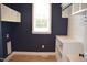 A view of the mudroom with custom shelving, cubbies, and a window for light at 4330 Medicus Ln, Franklinton, NC 27525