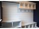 Custom mudroom featuring open cubbies, bench seating, and hanging hooks for organization at 4330 Medicus Ln, Franklinton, NC 27525