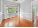 Cozy dining area featuring a bay window and hardwood floors at 5013 Dunwoody Trl, Raleigh, NC 27606