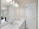 Well lit bathroom featuring a double sink vanity and large mirror, offering ample counter space at 5044 Brooke Lauren Ln, Raleigh, NC 27616