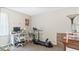 This bedroom features a functional desk, chair, and treadmill for added convenience and activity at 5064 Murrell Dr, Oxford, NC 27565