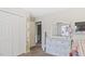 Bright bedroom with closet and view of ensuite bath, with lots of storage in the white dresser at 5064 Murrell Dr, Oxford, NC 27565