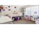 A bedroom featuring a lofted bed and decoratively adorned walls at 5064 Murrell Dr, Oxford, NC 27565