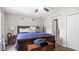Bedroom with ceiling fan and chest at the foot of the bed at 5064 Murrell Dr, Oxford, NC 27565