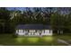 Charming home displays a covered porch and a traditional-style facade at 5064 Murrell Dr, Oxford, NC 27565