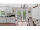 Eat-in kitchen featuring ample cabinet space, stainless steel appliances, and a view of the backyard at 5064 Murrell Dr, Oxford, NC 27565
