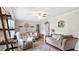 Inviting living room with cozy seating, rustic decor, and lots of natural light at 5064 Murrell Dr, Oxford, NC 27565