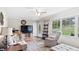 Cozy living room with natural light, wood floors, and comfortable furniture at 5064 Murrell Dr, Oxford, NC 27565