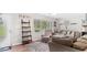 Comfortable living room filled with natural light, complemented by plush furniture and decor at 5064 Murrell Dr, Oxford, NC 27565