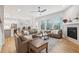 Spacious living room boasts ample seating, fireplace, and natural light at 5616 Horsewalk Cir, Raleigh, NC 27606