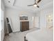 Main bedroom featuring a TV, dresser, and en-suite bathroom at 5616 Horsewalk Cir, Raleigh, NC 27606