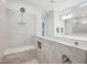 Beautiful shower with glass enclosure, shower head, and tiled bench at 5616 Horsewalk Cir, Raleigh, NC 27606